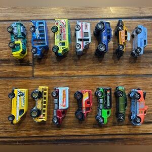 14 Matchbox cars. Used but good condition. Played with.